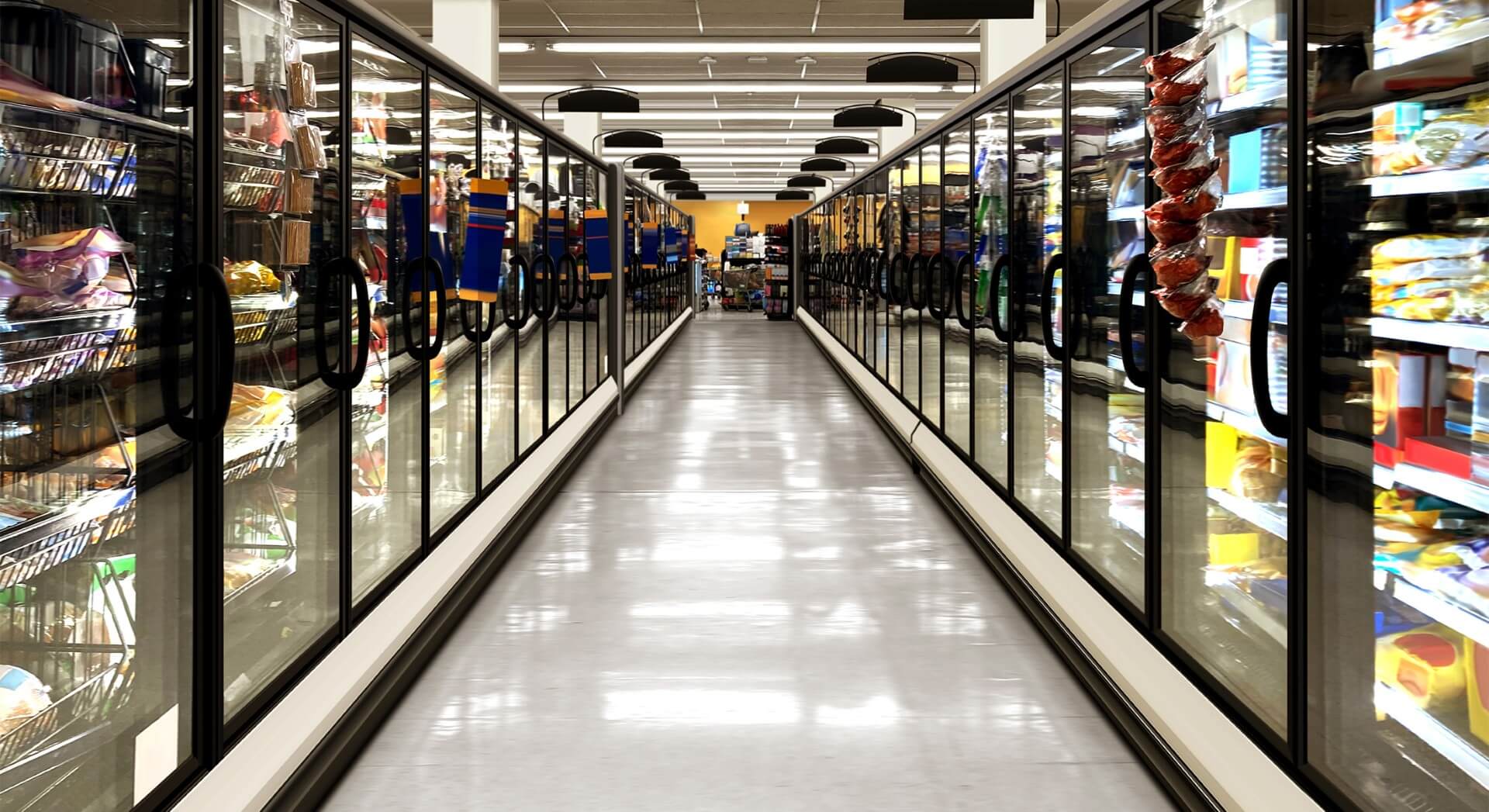 Interior view of a frozen food aisle in a grocery store, representing uninterrupted retail availability thanks to proactive cold chain planning during tariff uncertainty