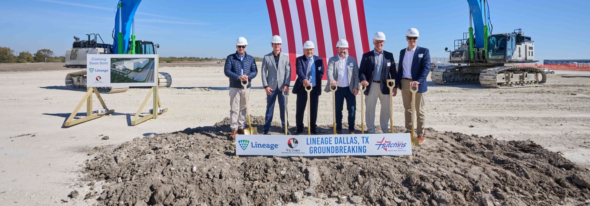 A group of men hold shovels during a groundbreaking ceremony for Lineage's latest cold storage facility in Texas