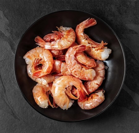 Frozen shrimp prepared for export and moving through the cold chain from port to plate