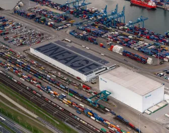 Lineage Cool Port 2 facility in Rotterdam, Netherlands featuring automated warehousing, IQF freezing and 24/7 port logistics operations.