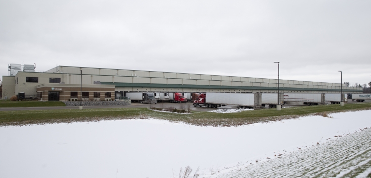 Exterior photo of Lineage's Stevens Point facility with snowy field in the foreground