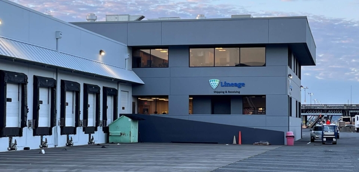 Lineage Seattle-Garfield facility with a view of loading docks and the 'Shipping & Receiving' sign under a morning sky