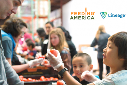 volunteers feeding children