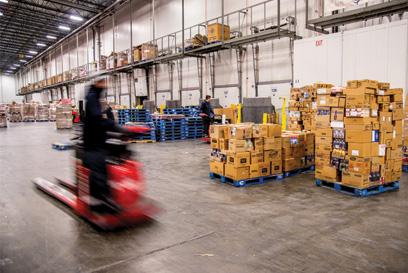 warehouse team member on a forklift