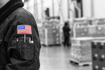 Lineage worker with flag patch on arm