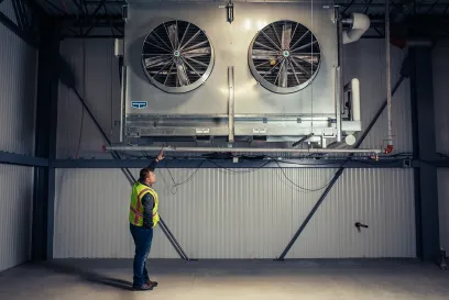 man checking cold storage equipment