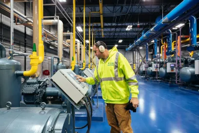 man checking equipment