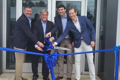 team at grand opening event