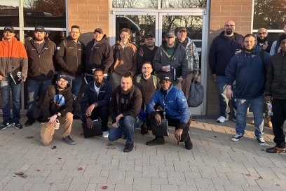 Group photo of Cohort 3 participants in the Lineage EDGE Program, gathered outdoors in front of a building, showcasing teamwork and leadership growth.