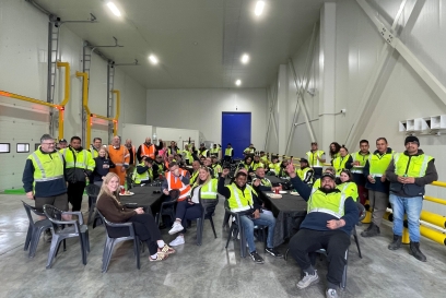 Lineage team members in New Zealand celebrate inside new cold storage warehouse