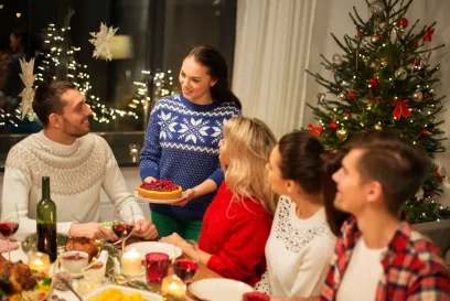 A group of people gathered around a table during a holiday feast