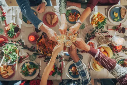 A group of people gathered around a table during a holiday feast