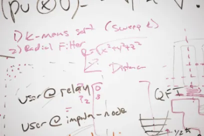 Lineage data science team analyzing supply chain models on a whiteboard during a network optimization session.