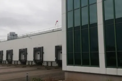 Lineage cold storage warehouse in Venlo, Netherlands with IQF freezing, case picking and backup power generator for product protection.